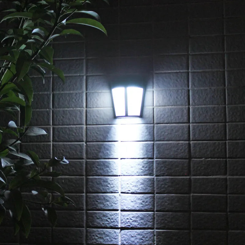Solar wall lamp with 6 LEDs and IP65 waterproof rating for outdoor garden lighting