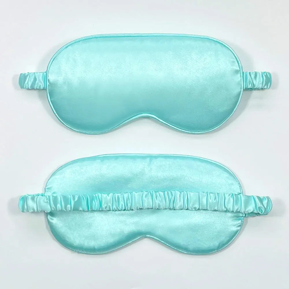 Reversible rayon satin sleep mask in a choice of colours with an elastic headband.