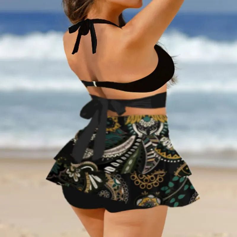 Women's purple bikini swimsuit with matching skirt showing high-waisted lace-up back design