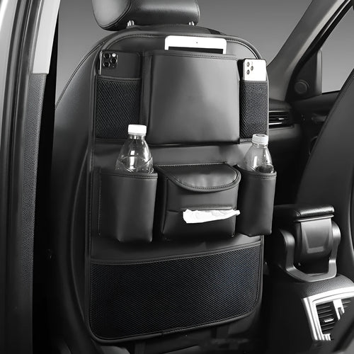 Leather car seat back storage bag in brown, hanging from a car headrest.