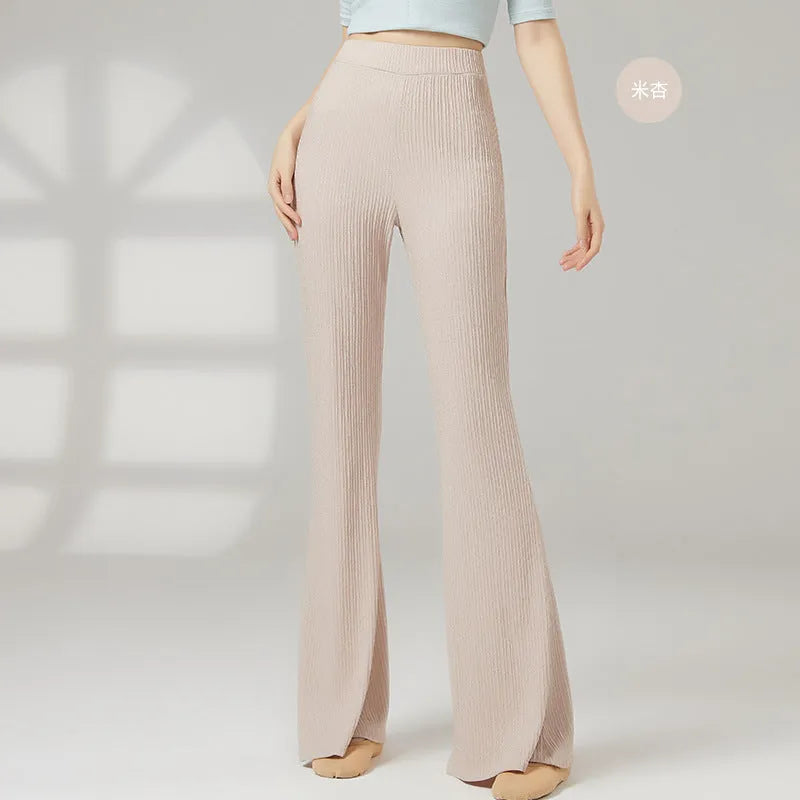 Women's solid colour dance practice trousers in polyester fabric for ballet training.