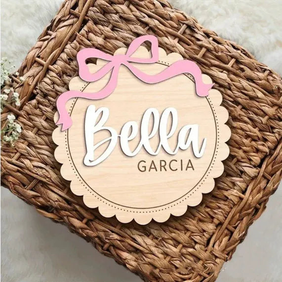 Square wooden baby room ornament with custom name, shown in 13cm and 15cm sizes.