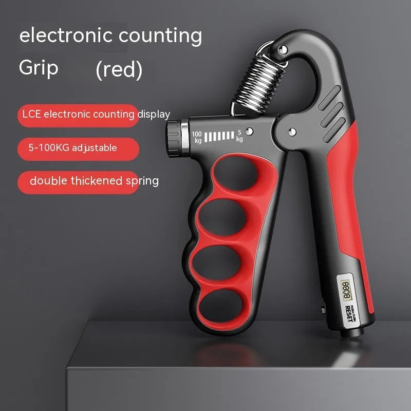 Orange electronic counter spring grip for hand strength training on a grey background.