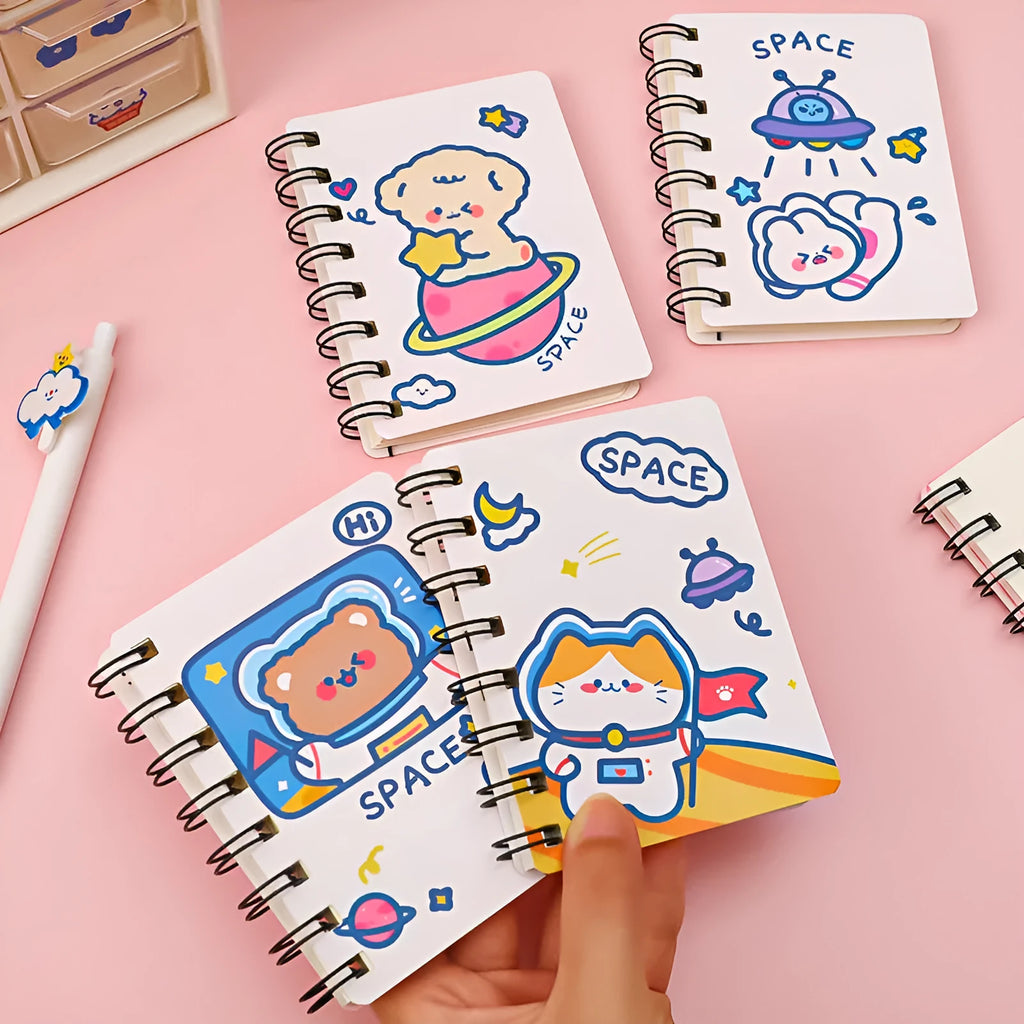 Astronaut themed flip-over pocket notebook showing 10.5cm by 8cm compact size