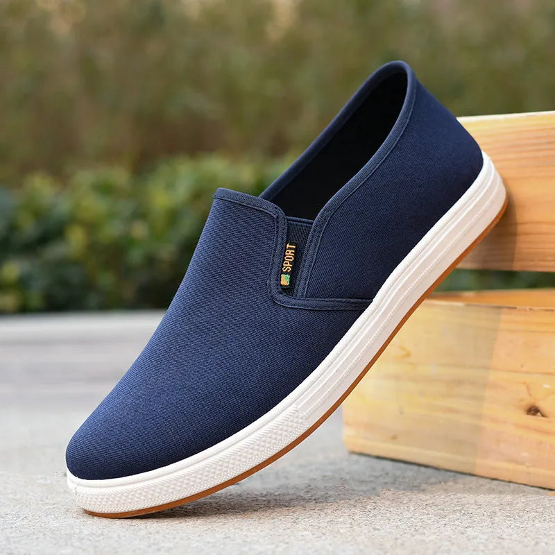 Men's black and blue slip-on canvas cloth shoes with round toe and shallow mouth design