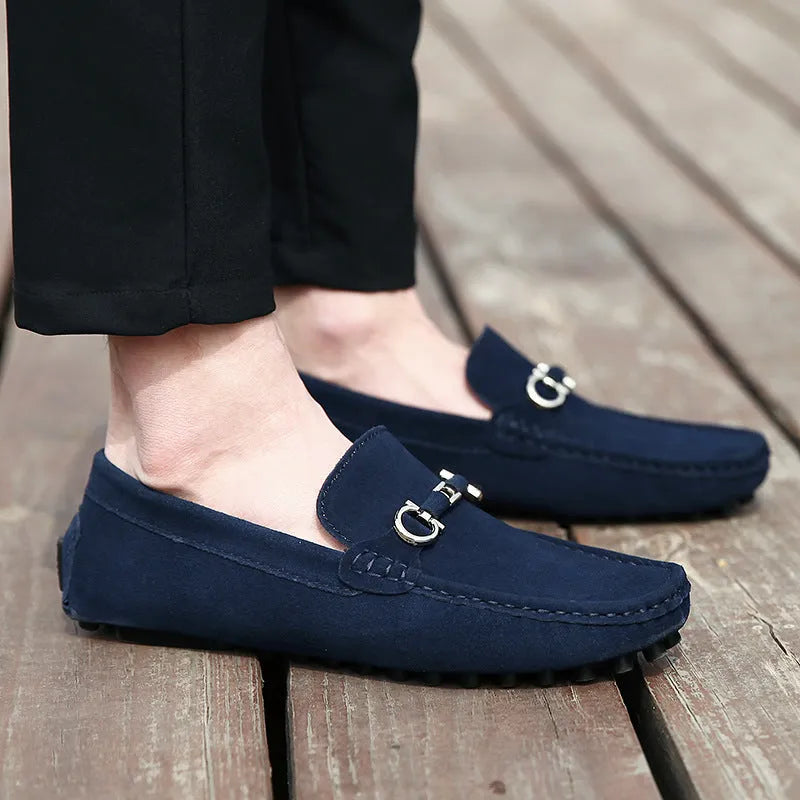 Men's black slip-on cowhide leather shoes with a square toe and flat heel on a white background