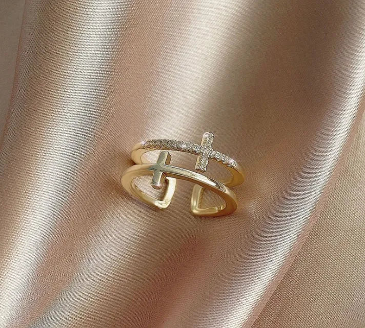 Adjustable copper ring with double cross design featuring zircon gems in sterling silver inlay, white gold colour