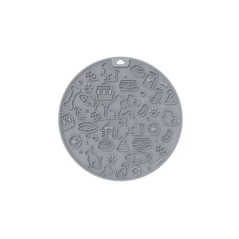Round silicone pet licking mat with suction cups in blue, grey, mint, orange, and pink colours.