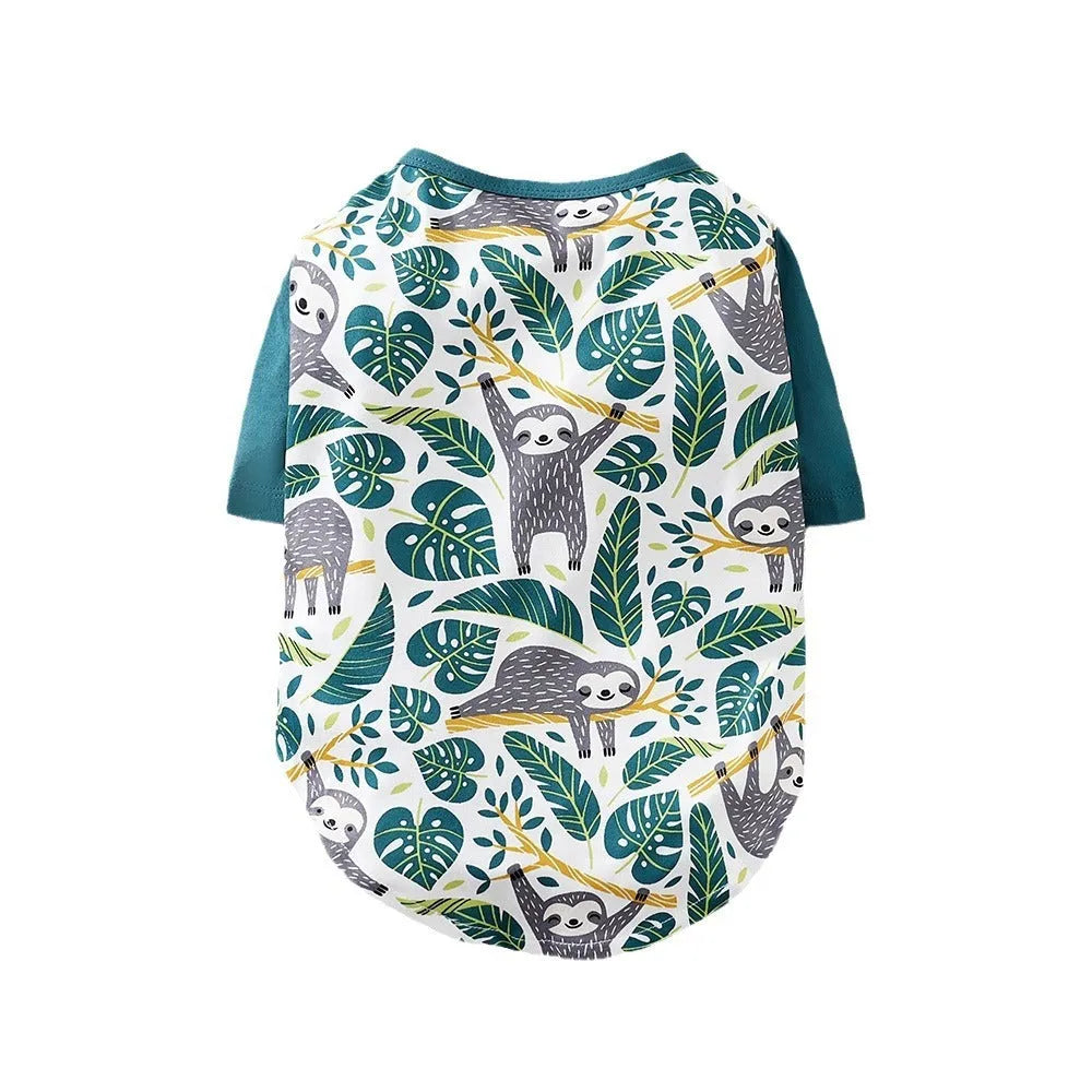 Full-print polyester t-shirt for a small dog, shown in one of six colour variants, with size chart for S, M, L, XL, XXL.