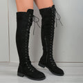 Black over-the-knee lace-up boots with round toe, flat rubber sole, and visible stitching details