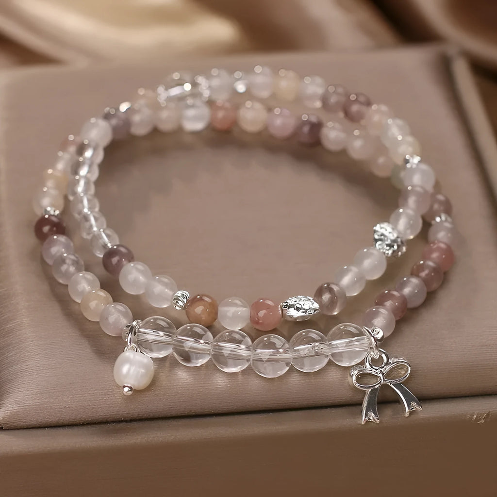 Chinese ancient style beaded butterfly bracelet on woman's wrist