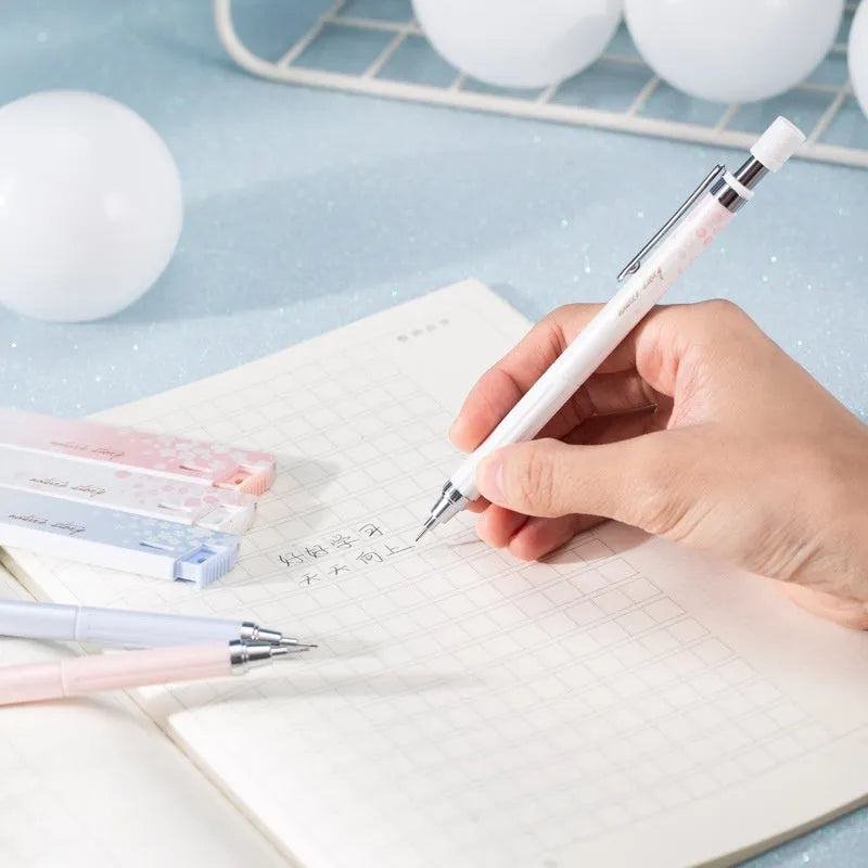 Sakura-themed automatic mechanical pencil set with three 0.5mm pencils and refill boxes