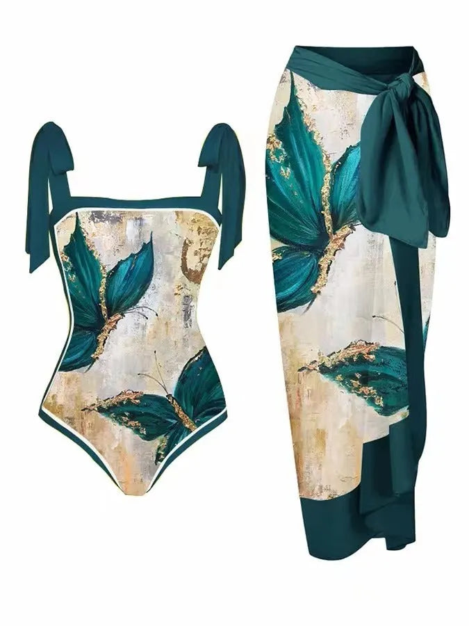 Women's printed floral two-piece swimsuit with a matching chiffon hip skirt.