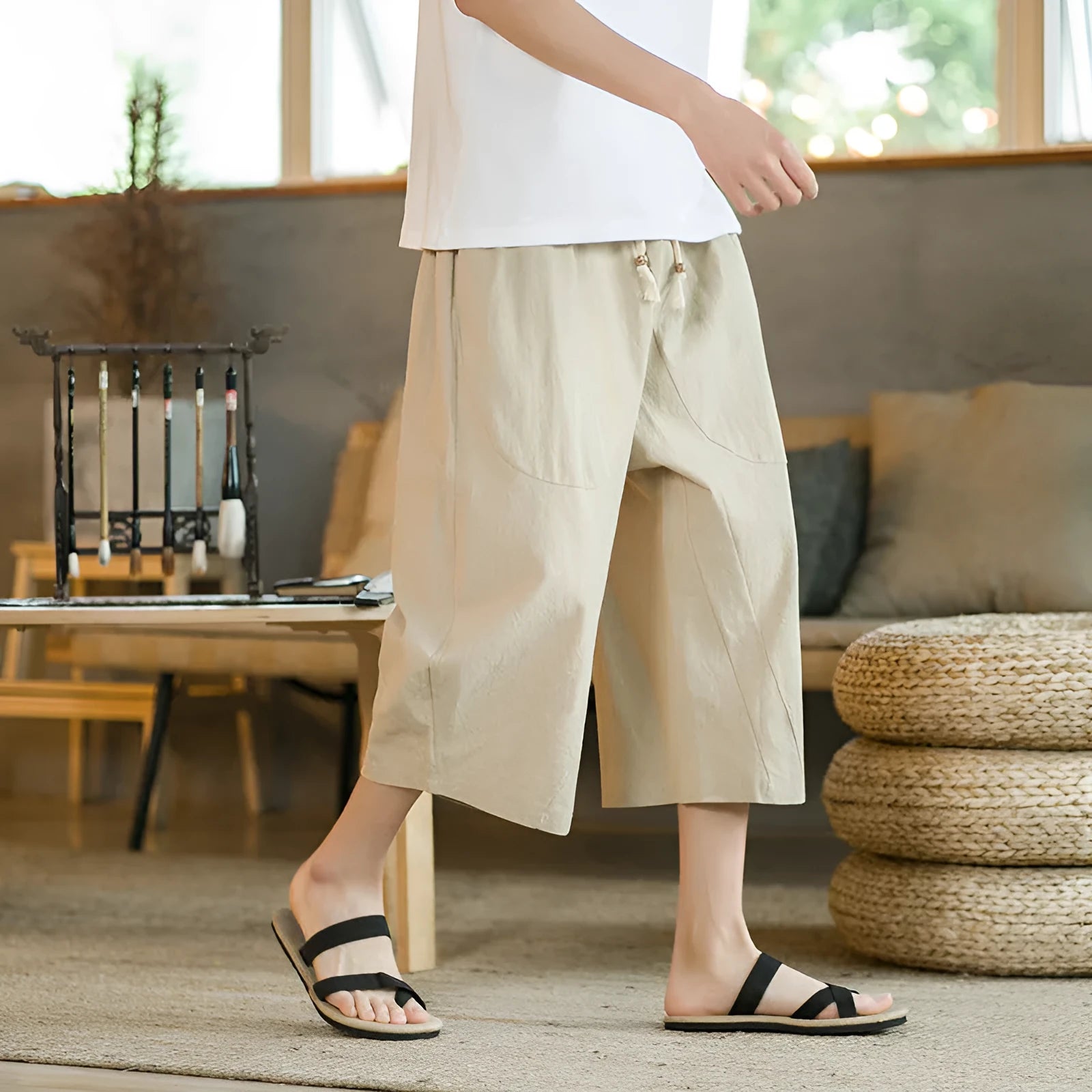 Straight cut linen summer shorts in khaki colour shown on hanger