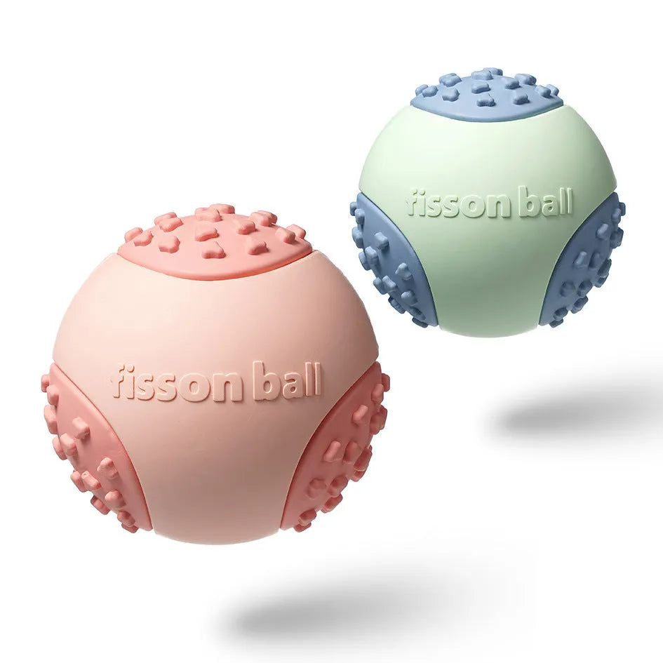 Green and pink rolling ball dog toy measuring 64mm diameter for small medium dogs