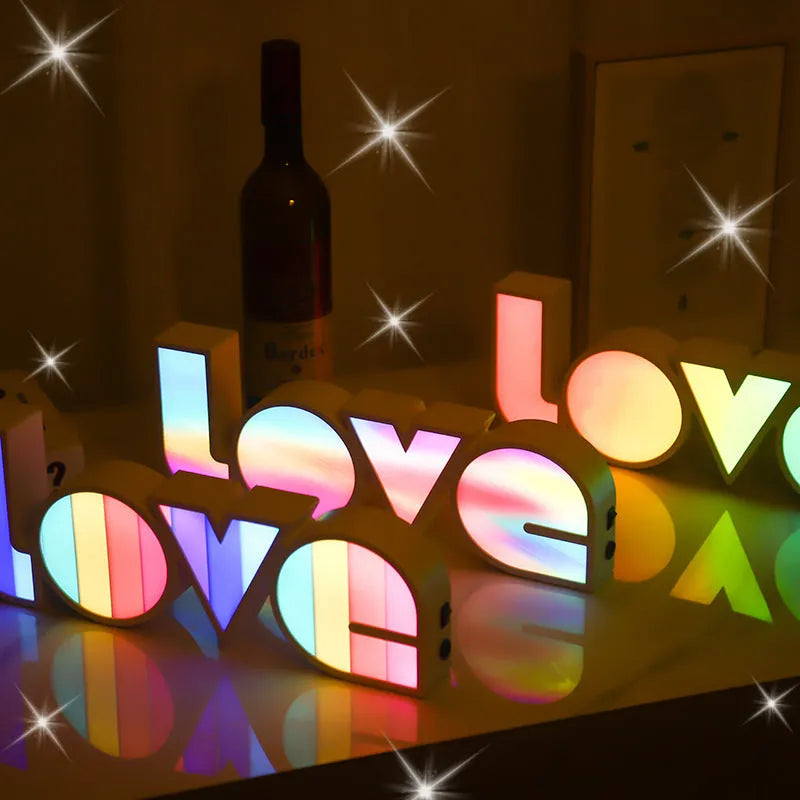 Rainbow coloured LED decorative light spelling LOVE, with USB cable.