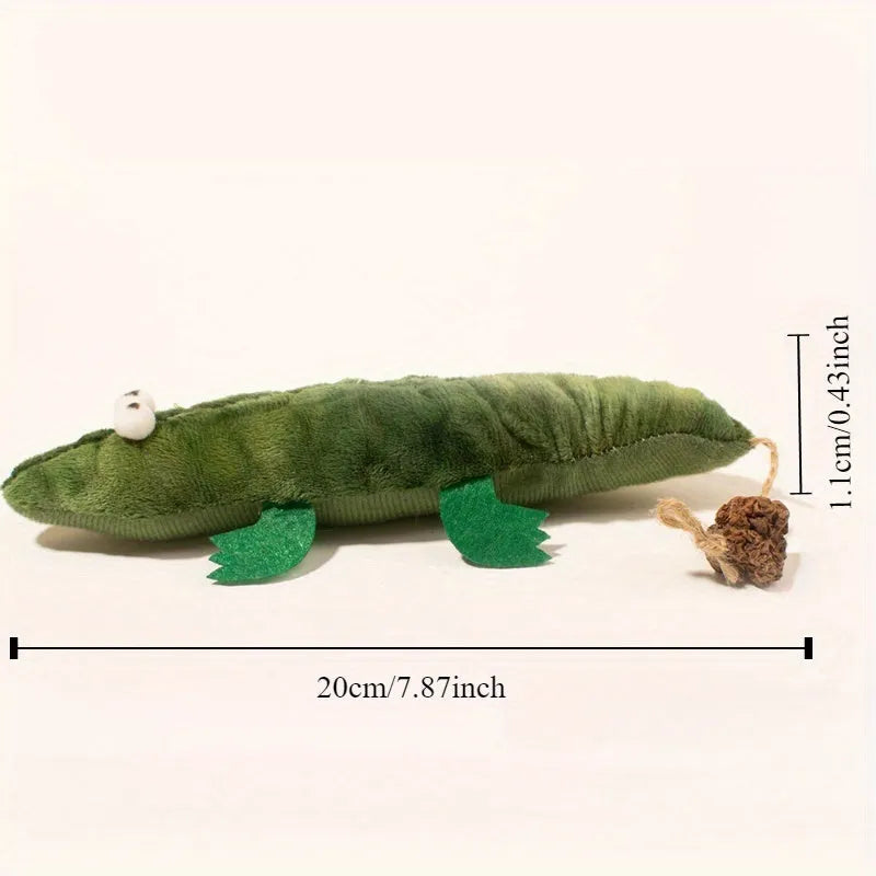 Green plush alligator cat toy with catnip filling and peppermint scent for oral cleansing