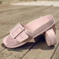 Women's grey blue EVA flip-flops with a buckle strap on a soft sole.