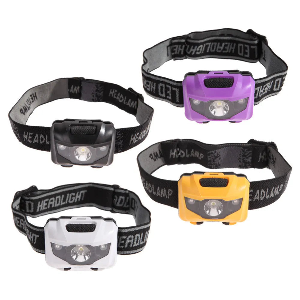 Black waterproof head torch with white and red LEDs mounted on adjustable headband for outdoor use.