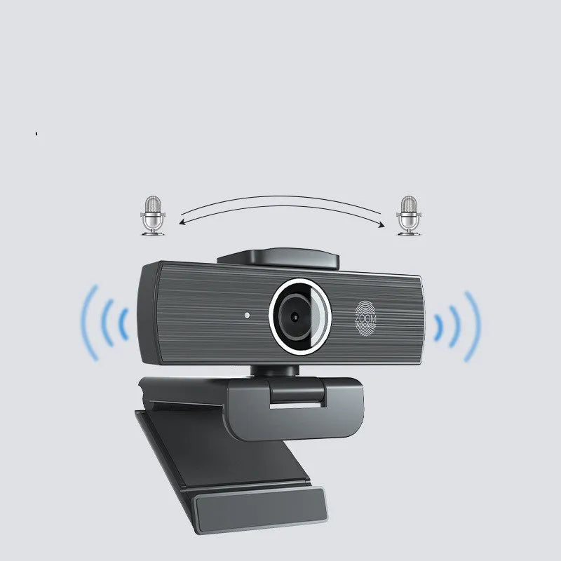 Black 8MP 4K USB computer webcam with magnetic privacy cover on a desktop