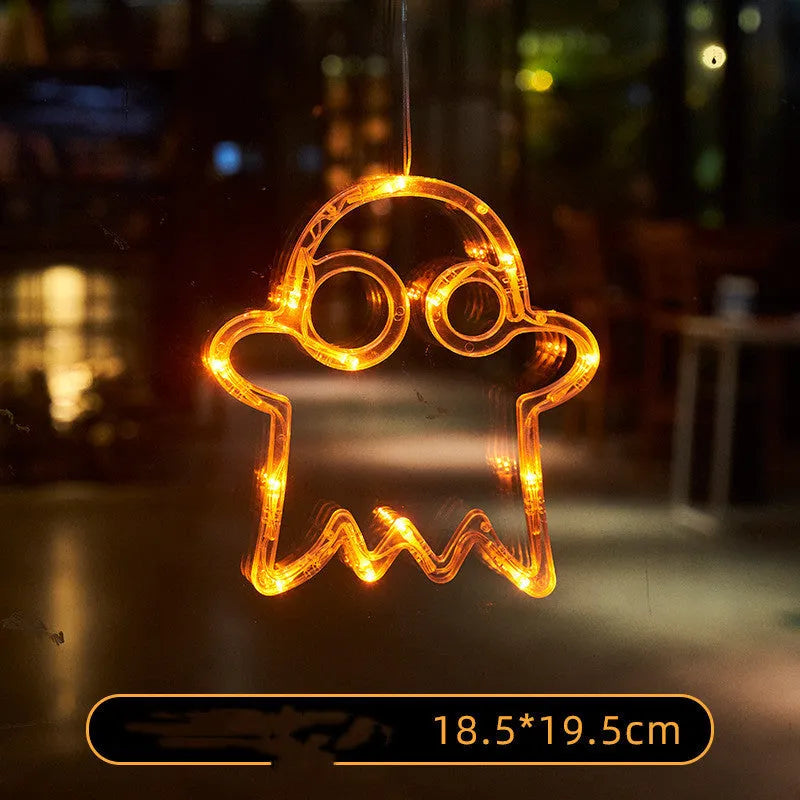 Halloween window hanging LED lights with suction cups showing multiple horror-themed designs powered by batteries