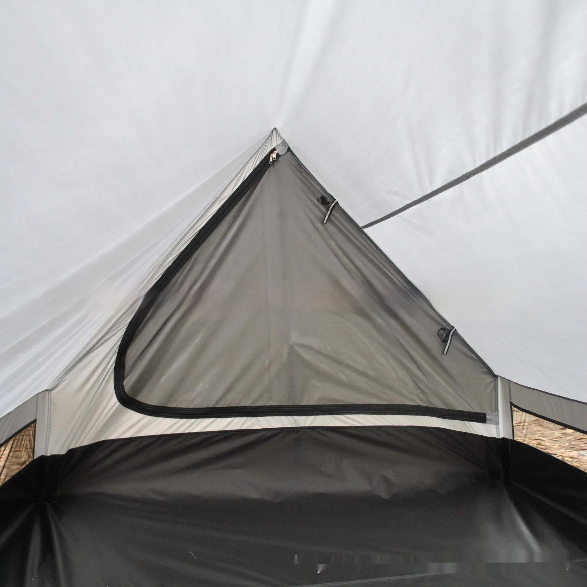 Brown or white A-line cabin tent using hiking canes for support with dimensions 210x150x110cm