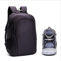 Large black Oxford fabric drone backpack showing multiple internal organiser pockets for laptop and camera.