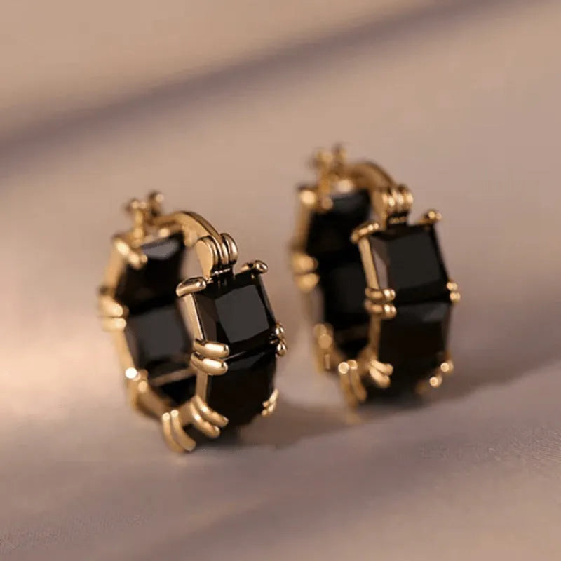 Geometric U-shaped earrings with round zircon crystals in black, pink or white with gold electroplating