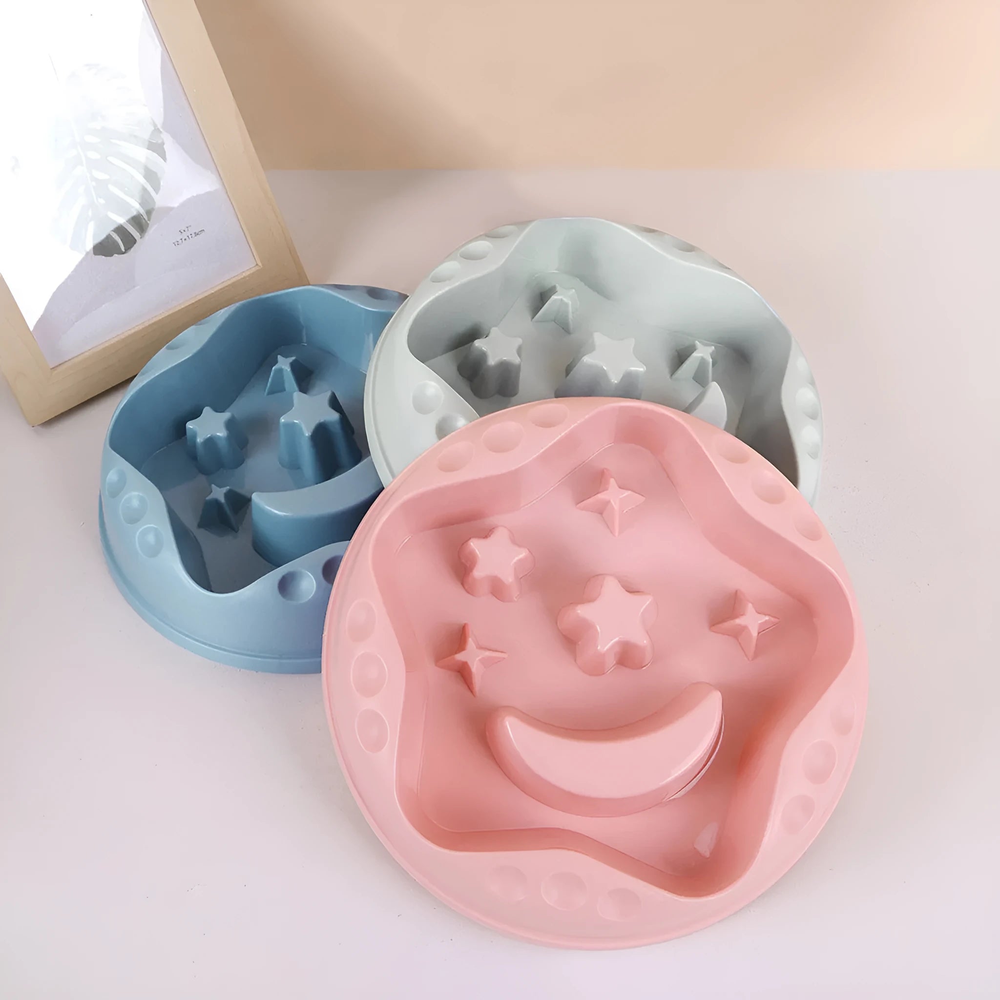 Large blue dog slow feeder bowl with moon star wings pattern and non-slip base