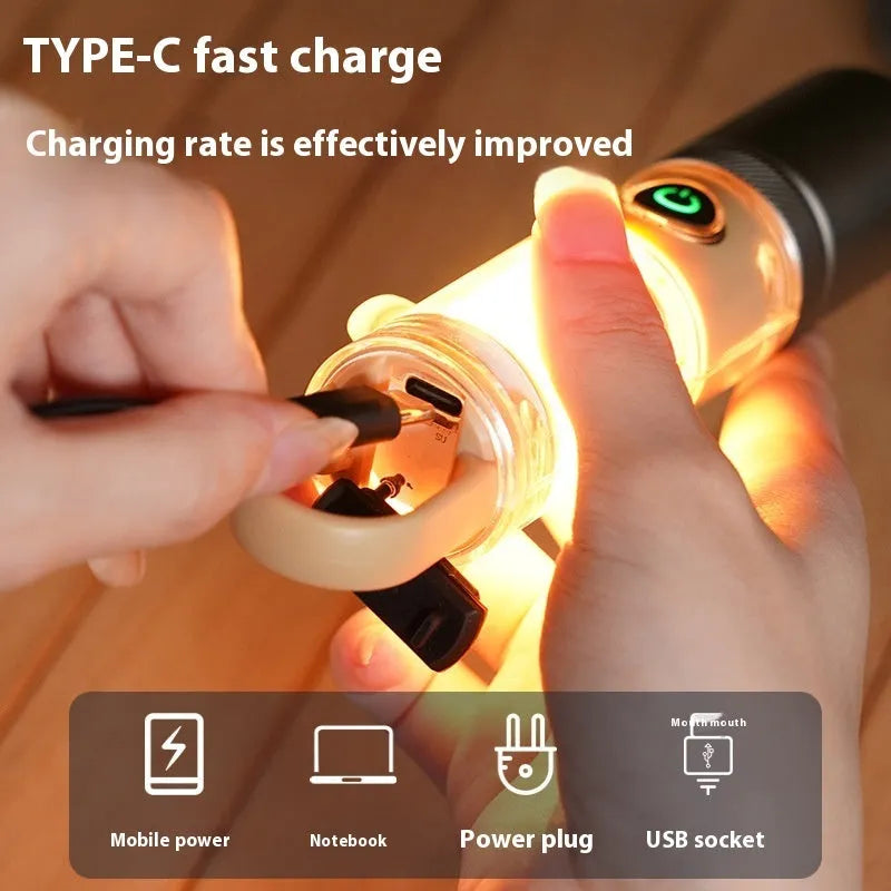 Orange and beige dual light source flashlight with hook and optical zoom ring