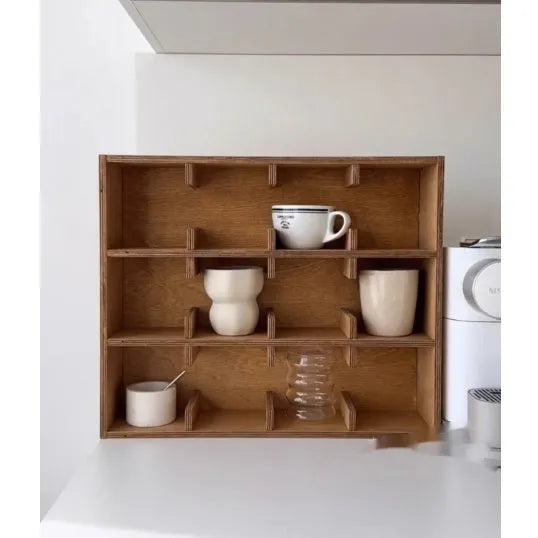 Square solid wood cup storage rack with birch finish and multiple square compartments for organising mugs.