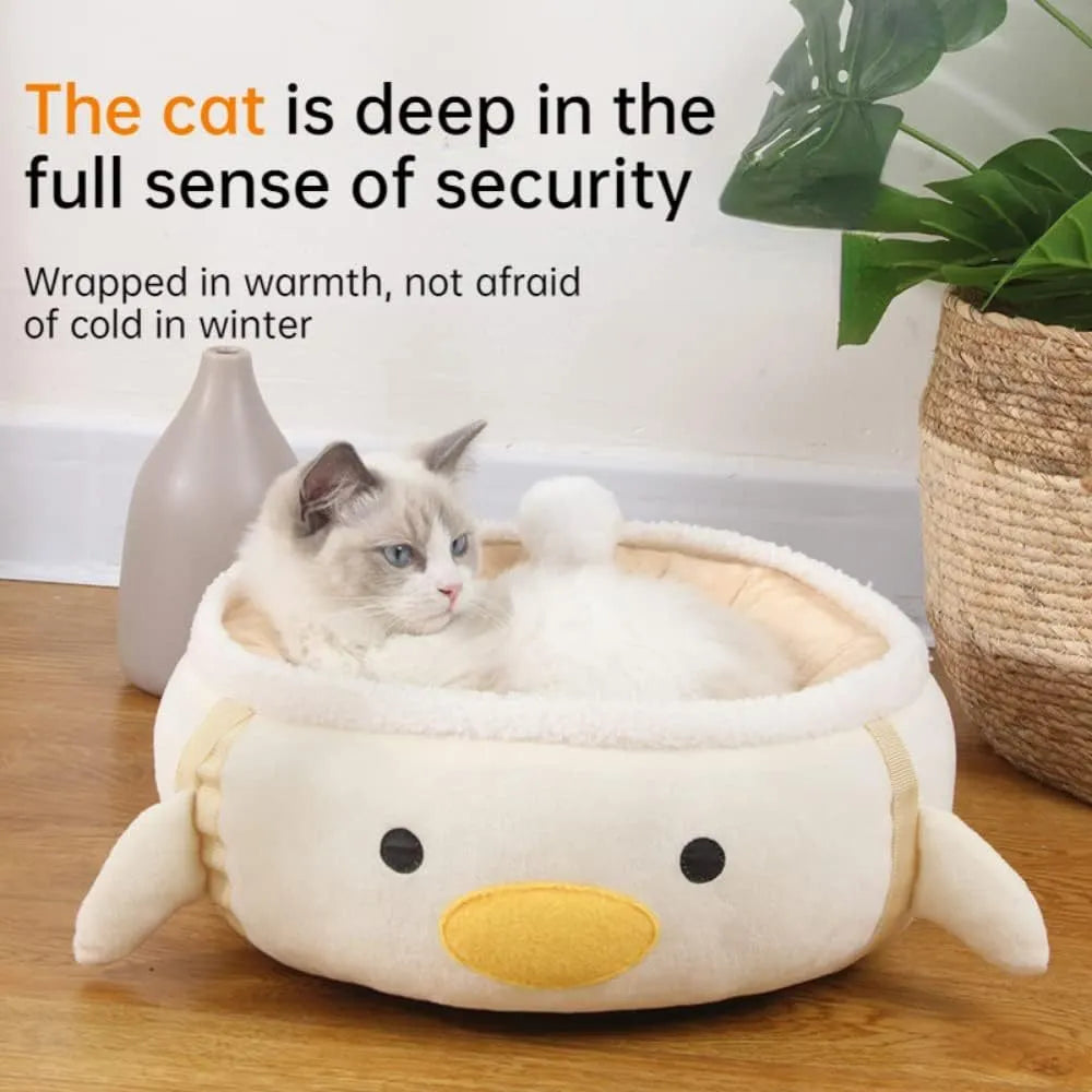 Green dinosaur and chick shaped cat bed shown both flat and hanging as a hammock