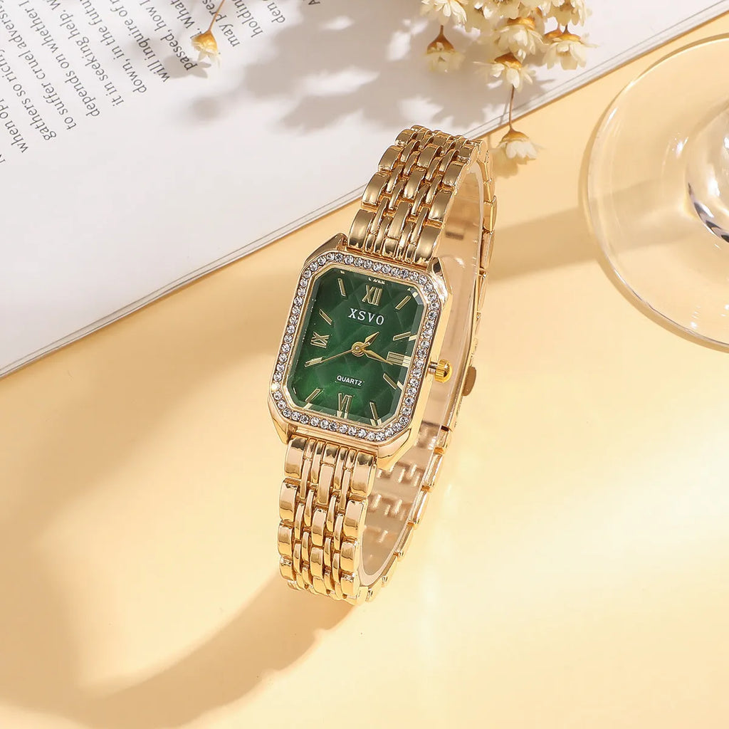 Gold green square women's watch with four matching bracelets on a white background.