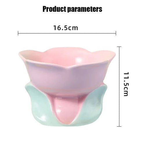 Blue ceramic raised pet bowl with floral pattern and non-slip base for cats and small dogs.