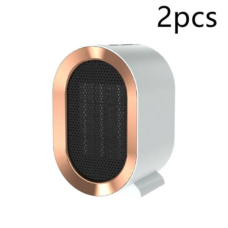 Black desktop electric fan heater with mechanical dial controls and ceramic heating technology