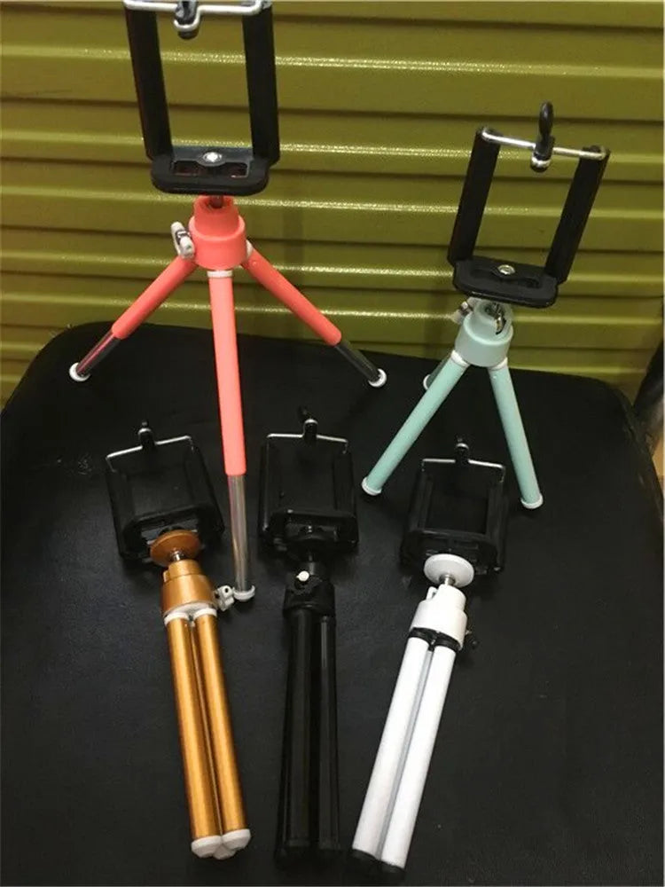 Black desktop phone holder with two-section adjustable bracket for smartphones