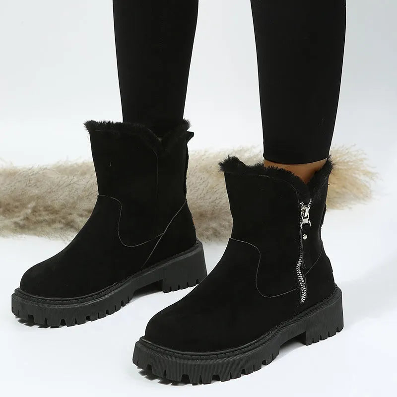 Women's black thick plush high-top snow boots with a side zipper and faux fur lining.