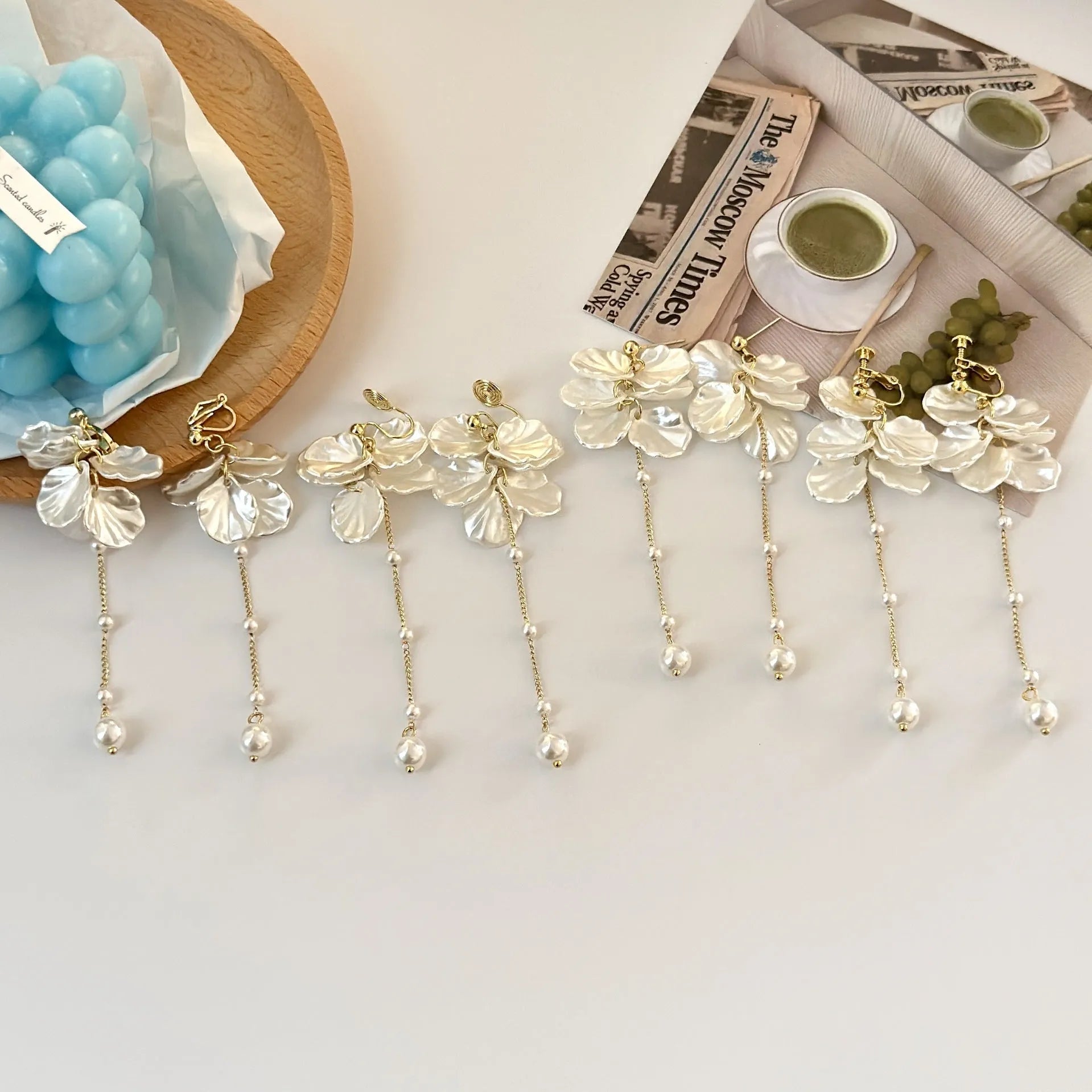 Women's shell pearl tassel earrings with four clip options measuring 8.8cm length