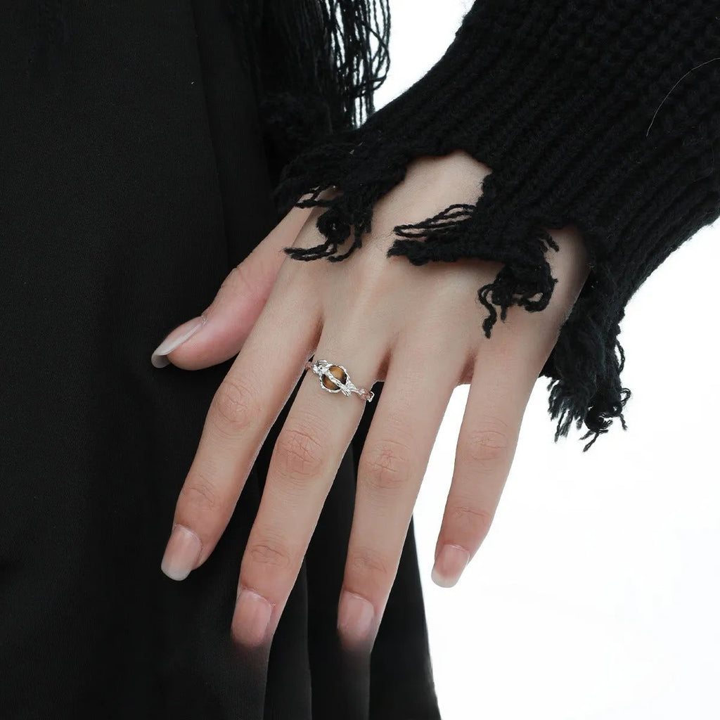 White gold colour Saturn Tigereye open adjustable ring for women on display