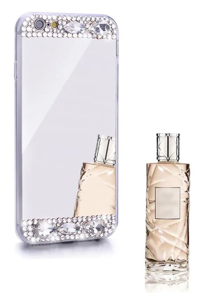 Gold rhinestone silicone back case on a Huawei smartphone.