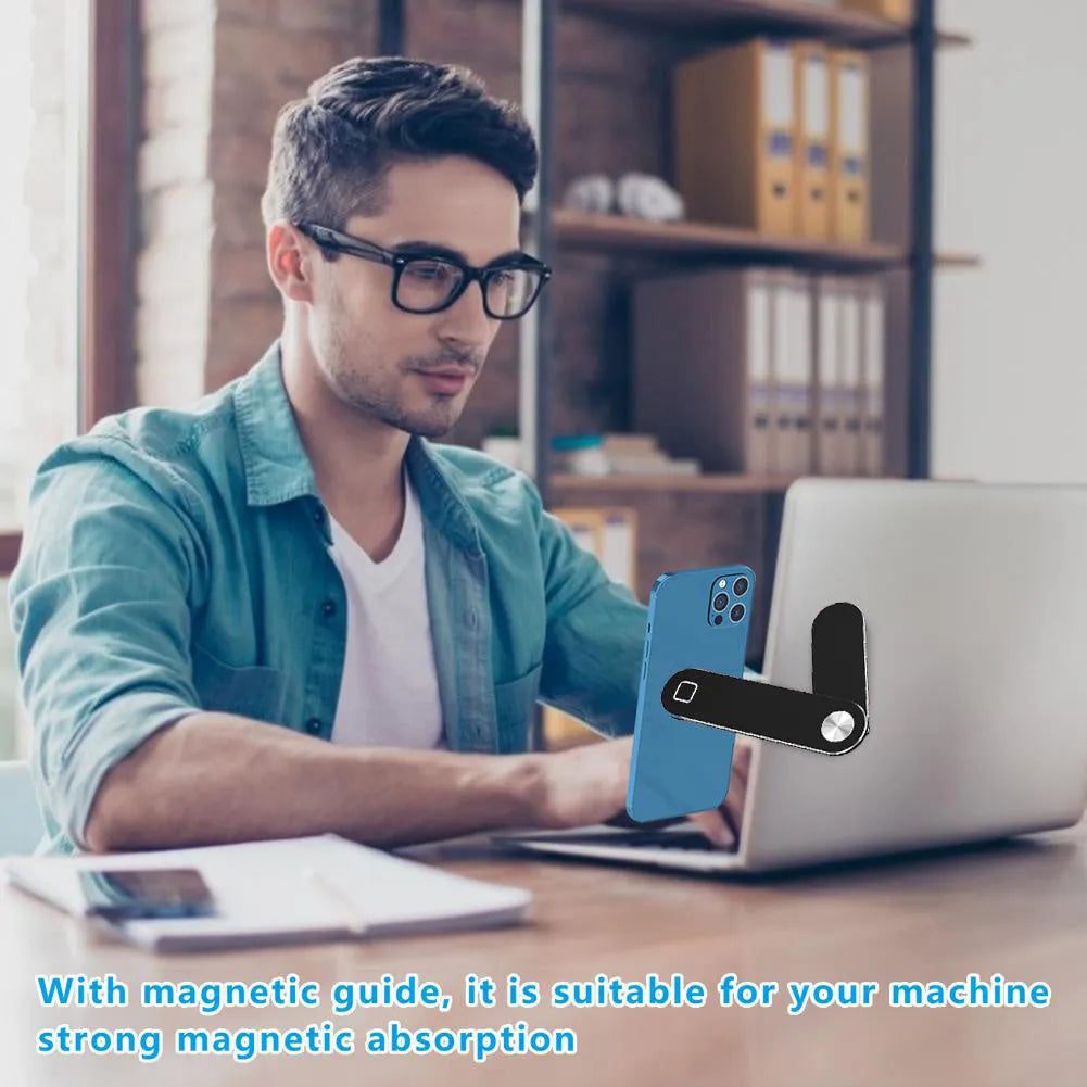 Black aluminium laptop phone holder with magnetic mount attached to laptop showing dual screen setup
