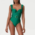 Women's grey one-piece swimsuit with gauze skirt showing sleeveless V-neck design