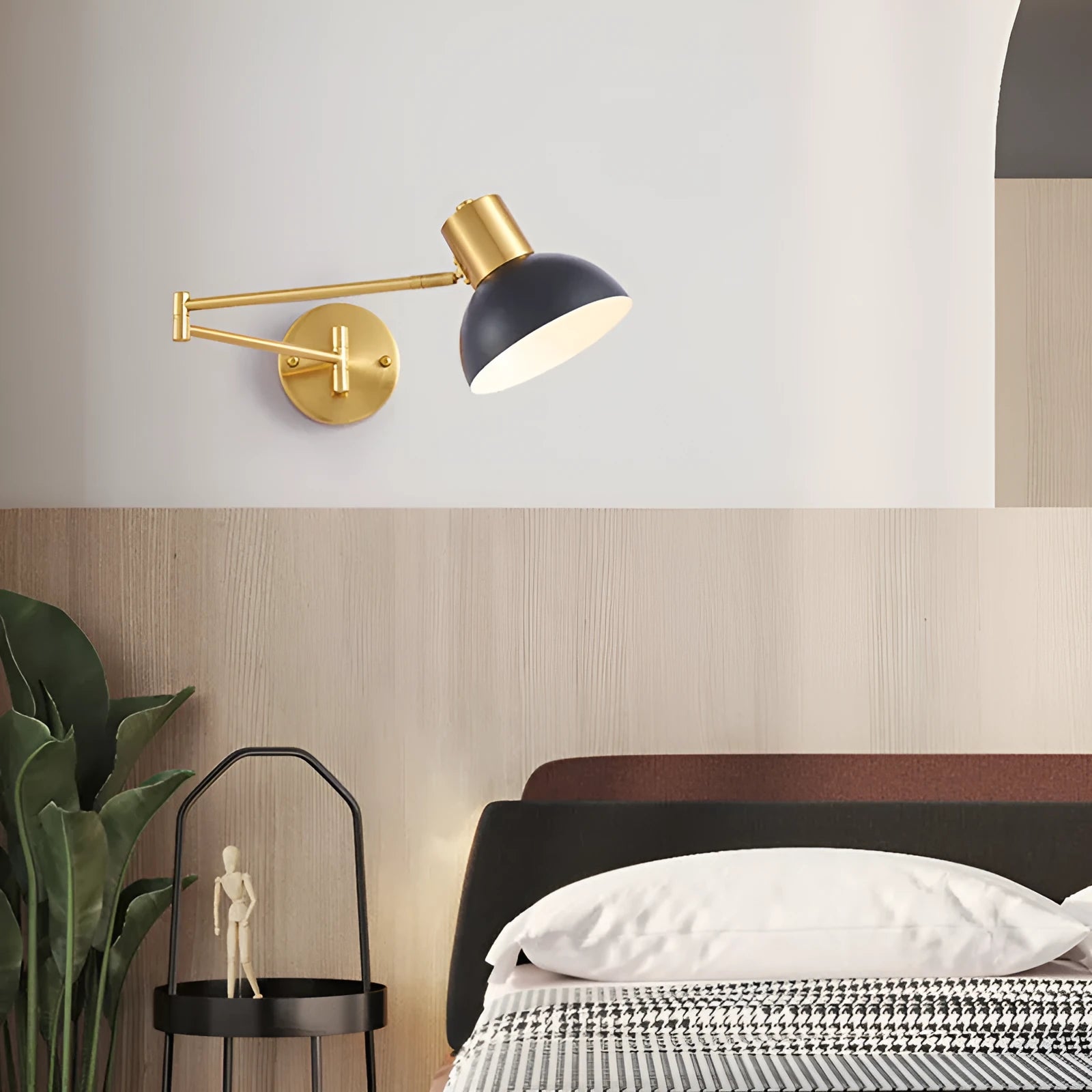 Modern minimalist double-section rocker arm wall lamp mounted on a wall with adjustable arms extended.