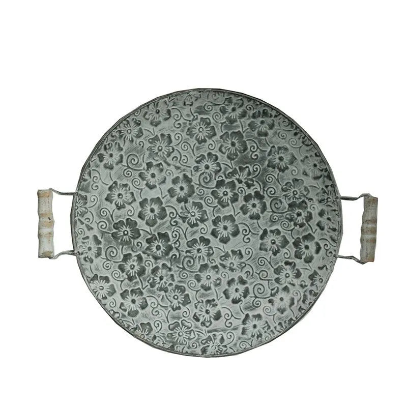 Round wrought iron metal storage tray in two sizes for jewellery and home organisation.