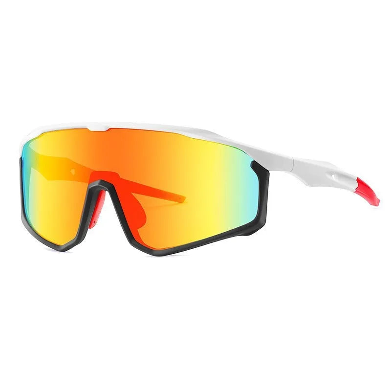 Full-frame mountaineering goggles for climbing with colourful UV-protective lenses on a black background.