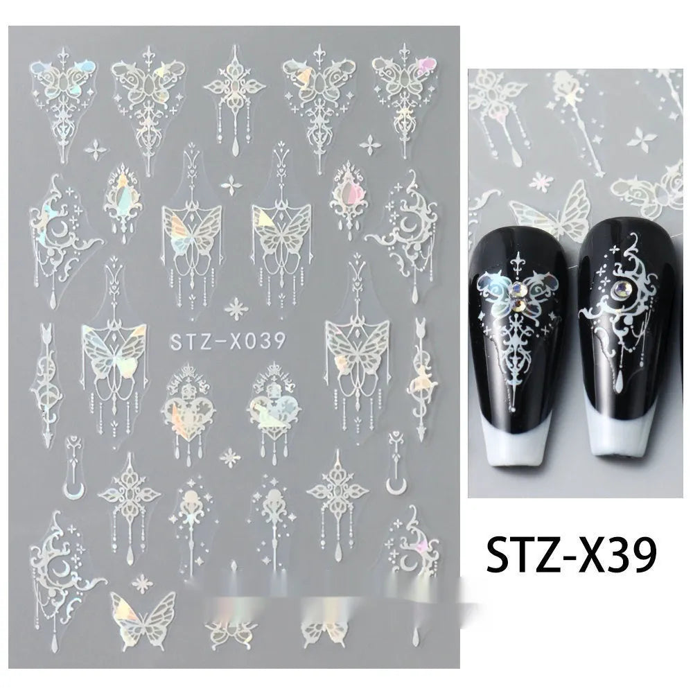 Sheet of black and silver love heart pattern nail art stickers with a plastic nail patch.