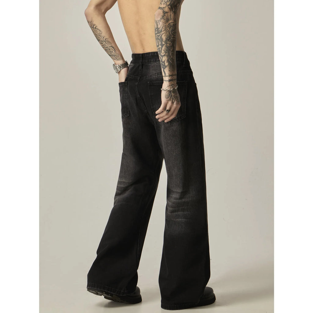 Black retro straight-leg jeans with zip fly opening and loose fit on size chart
