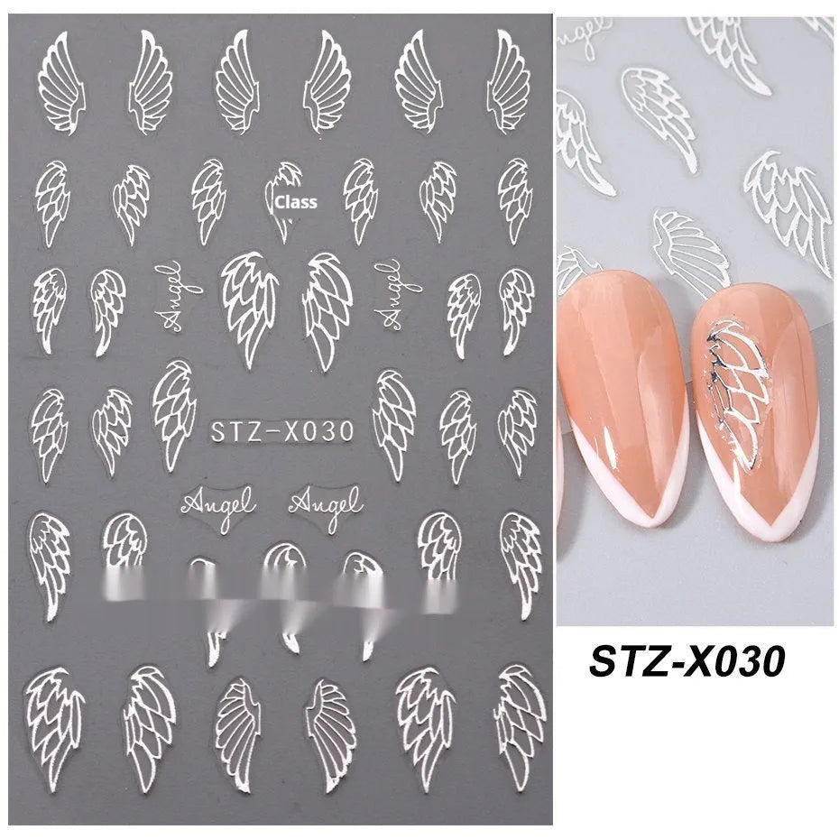 Sheet of black and silver love heart pattern nail art stickers with a plastic nail patch.