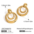 Round double layer hollow stud earrings with a gold electroplated finish on a titanium steel base.