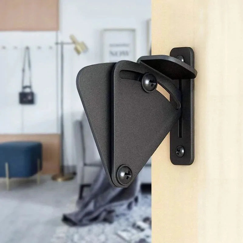 Black stainless steel sliding barn door lock shown in S and M sizes for different door gaps